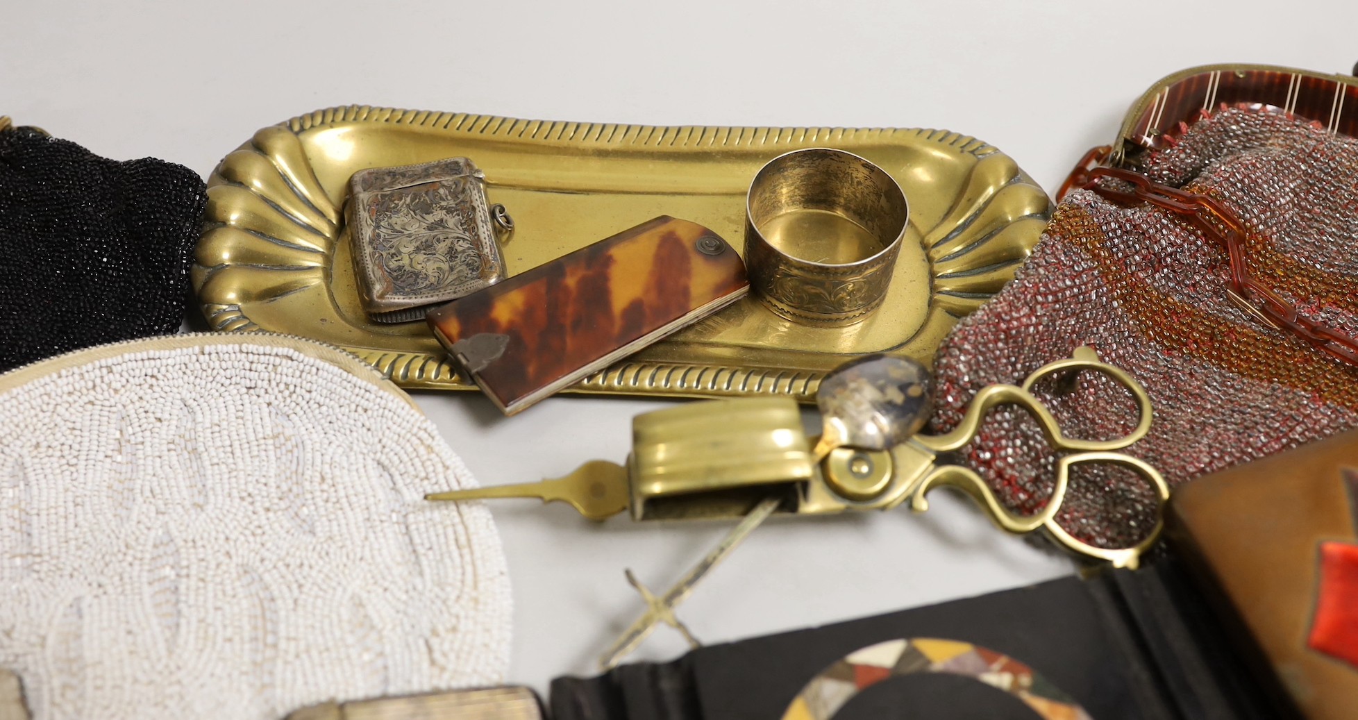 A paisley pattern silk shawl (damaged), together with four beaded evening bags, A Japanese copper, enamelled tin by Ando, 15cms wide x 8.5cms deep, and other ephemeral items including silver and an S. Mordan & Co. bone p